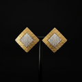 Vintage gold and silver diamond-shaped clip-on earrings, front view