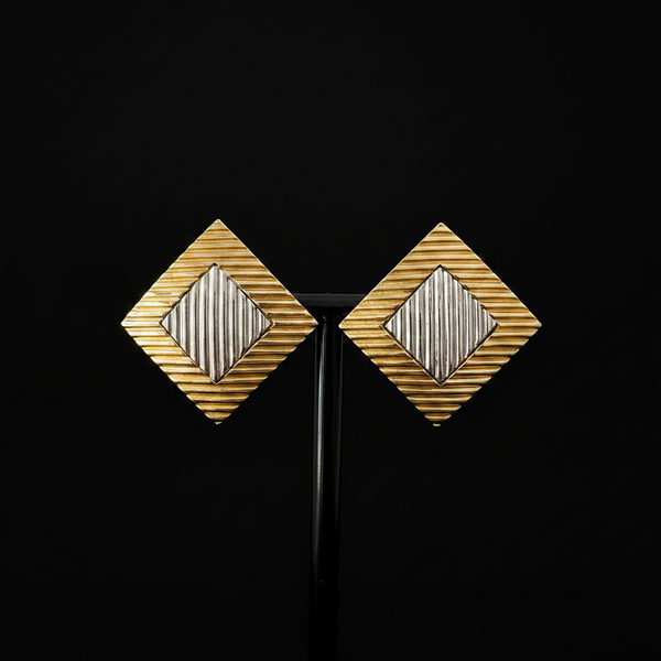 Vintage gold and silver diamond-shaped clip-on earrings, front view