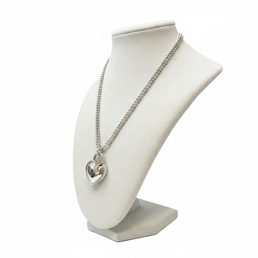 Tiffany & Co. 925 Silver & 750 Gold Heart Lock and Key Necklace 1994 - Low Angle