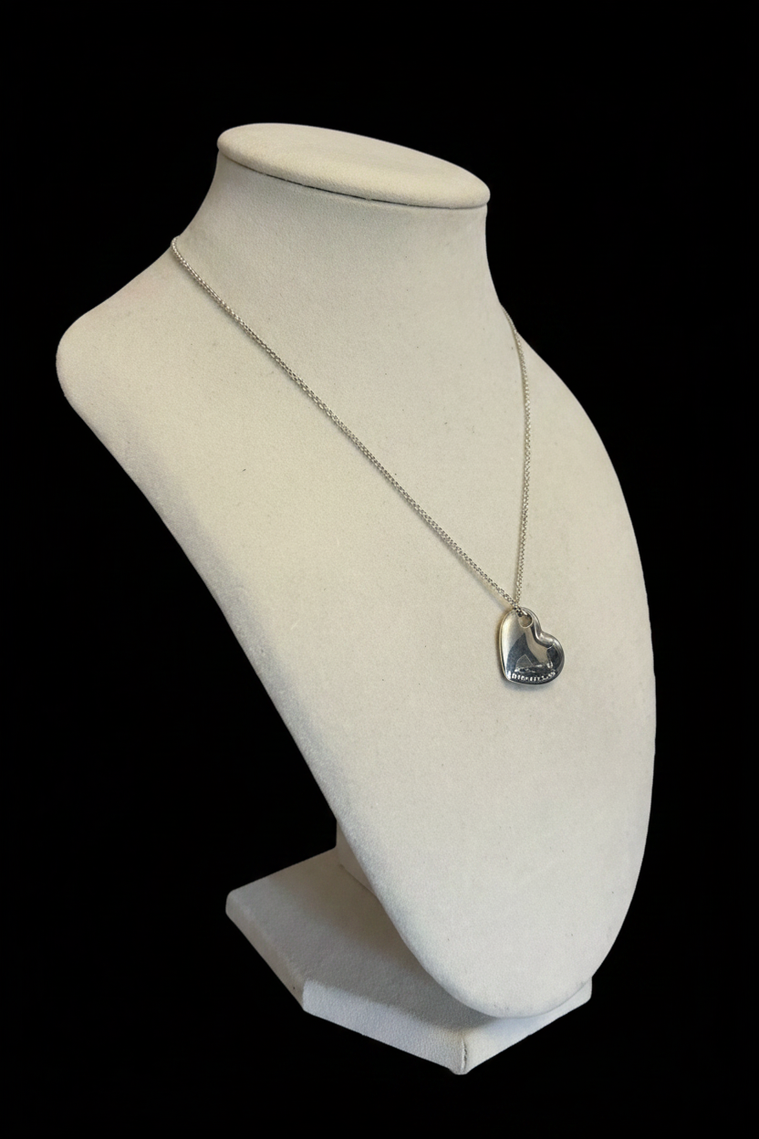 Silver Heart Pendant Necklace - Angled Black Background